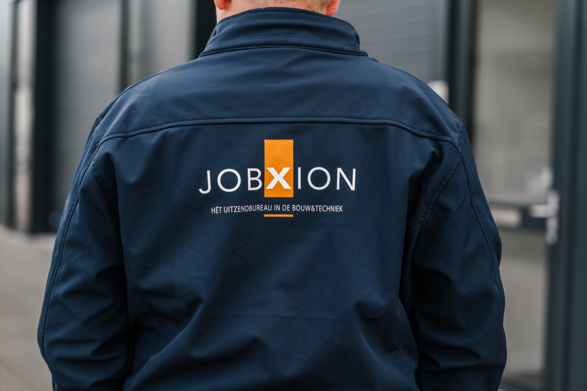 Vakman van Jobxion aan het werk op een bouwproject